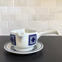 Load image into Gallery viewer, Gravy Boat Underplate in the Tangier pattern. Features a Moroccan-style geometric floral pattern in shades of purple, green, and deep blue on a light gray ground. Lambeth Stoneware. Overall excellent condition, free from chips/cracks with normal age-related wear. The exception is the Casserole with a chip to the rim and underside of one handle. Marked &quot;Lambeth Stoneware, Royal Doulton, Tangier, L.S.1005, Made in England, Dishwasher Proof, Detergent Proof, Freezer &amp; Oven Proof, © 1973.
