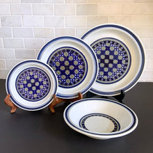 Load image into Gallery viewer, Vintage Plate Bowl in the Tangier pattern. Features a Moroccan-style geometric floral pattern in shades of purple, green, and deep blue on a light gray ground. Lambeth Stoneware. Overall excellent condition, free from chips/cracks with normal age-related wear. The exception is the Casserole with a chip to the rim and underside of one handle. Marked &quot;Lambeth Stoneware, Royal Doulton, Tangier, L.S.1005, Made in England, Dishwasher Proof, Detergent Proof, Freezer &amp; Oven Proof, © 1973.
