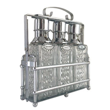 Load image into Gallery viewer, Keep your liquid gold safe with this vintage mid-century era tantalus lockable bar featuring three pressed glass decanters with chrome pumps, reversible liquor tags and sturdy chrome caddy. A fantastic addition to your barware collection!

Overall measures 11 1/2 x 4 x 13 1/4

Each decanter hold 1 quart or 1 litre

Note, lock not included.
