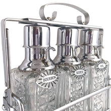 Load image into Gallery viewer, Keep your liquid gold safe with this vintage mid-century era tantalus lockable bar featuring three pressed glass decanters with chrome pumps, reversible liquor tags and sturdy chrome caddy. A fantastic addition to your barware collection!

Overall measures 11 1/2 x 4 x 13 1/4

Each decanter hold 1 quart or 1 litre

Note, lock not included.
