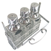 Load image into Gallery viewer, Keep your liquid gold safe with this vintage mid-century era tantalus lockable bar featuring three pressed glass decanters with chrome pumps, reversible liquor tags and sturdy chrome caddy. A fantastic addition to your barware collection!

Overall measures 11 1/2 x 4 x 13 1/4

Each decanter hold 1 quart or 1 litre

Note, lock not included.
