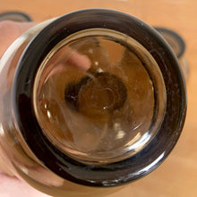 Load image into Gallery viewer, Close-up of base of a vintage Dominion Glass Tulip tumbler, showing the maker's mark
