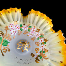 Load image into Gallery viewer, Antique opalescent glass compote featuring graduating of colour from pale to deep yellow, featuring hand painted enamel florals in white, mauve, green and gold with a double crimped gold gilt edge. The applied pedestal is clear green tinged blown glass with gold gilt. Crafted by Tazza Glass, Czechoslovakia, 1920s. A gorgeous piece of early art glass!  In excellent condition, free from chips/wear.  Measures 7 1/2 x 5 inches
