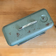 Load image into Gallery viewer, Top view of vintage ZERO electric box fan showing teal enamel housing with age-worn patina, chrome carry handle, and speed control knob

