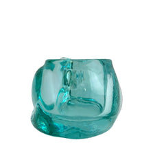 Load image into Gallery viewer, Side profile of vintage Indiana Glass teal green sleeping cat votive, showing curled body and tail detail
