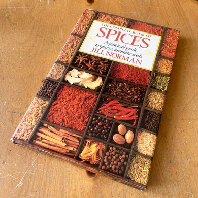 Vintage The Complete Book of Spices – A Practical Guide to Spices & Aromatic Seeds is chalked full of information using spices in everyday living and cooking. Author JIll Norman, publisher Penguin Book, Britain 1990. This 160 page hardcover book is filled with beautiful photographs and illustrations. The perfect book for the novice of advanced herb gardener!

In excellent condition, minor wear to the jacket.