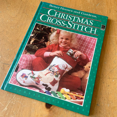 Vintage Christmas Cross-Stitch is chalked full of sweet cross-stitch patterns for the holiday season. Published by Better Homes and Gardens, 1987. This 80 page hardcover book is filled with beautiful photographs and charts. The perfect book for the embroidery enthusiast!

In excellent condition.