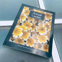 Load image into Gallery viewer, The Harrowsmith Annual Garden offers 176 pages of information on the characteristics and care requirements of many popular annual garden plants. Filled with stunning photographs and jammed with information, this is a must-have guide for growing annuals. Published by Camden House.  In excellent condition.
