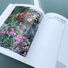 Load image into Gallery viewer, The Harrowsmith Annual Garden offers 176 pages of information on the characteristics and care requirements of many popular annual garden plants. Filled with stunning photographs and jammed with information, this is a must-have guide for growing annuals. Published by Camden House.  In excellent condition.
