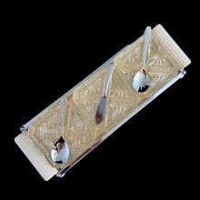 Load image into Gallery viewer, Vintage Art Deco 3-part relish tray featuring ribbed and curled bakelite handles and round feet, removable square cut glass inserts, with chrome-plated spoons and knife. Crafted by Zimco, England, 1950s. The epitome of elegance in entertaining for table or bar.

In excellent vintage condition no chips. There is discolouration on the paper under the glass in the tray, but it can easily be replaced.

Measures 14 x 4 3/4 x 1 3/4 inches, each glass insert measures 3 7/8 x 3 7/8 x 1 inches
