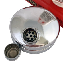 Load image into Gallery viewer, Vintage mid-century glass cocktail shaker featuring 6 classic cocktail recipes in black with illustrated figures in red on a frosted panel, accented with a border of red stripes with &quot;A Votre Santé • Salud • To Your Health • Skol&quot; in white, topped with chrome lid. Reclaim the pleasure of being your home&#39;s star mixologist...no Googling required!

In excellent condition, no chips/cracks. The colours of the printing remain vibrant. Wear commensurate with age.

Measures 3 1/4 x 7 inches

Capacity 16 ounce
