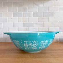 Load image into Gallery viewer, Vintage turquoise Butterprint 444 Cinderella mixing bowl. Crafted by PYREX, USA, 1957 - 1968. A true kitchen classic!

In very good vintage condition, scratches to the exterior, but otherwise no chips and shiny. Doesn&#39;t appear to have been used as there are no utensil marks on the interior.

Measures 13 x 4 1/2 inches

Capacity 4 quarts
