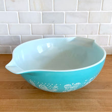 Load image into Gallery viewer, Vintage turquoise Butterprint 444 Cinderella mixing bowl. Crafted by PYREX, USA, 1957 - 1968. A true kitchen classic!

In very good vintage condition, scratches to the exterior, but otherwise no chips and shiny. Doesn&#39;t appear to have been used as there are no utensil marks on the interior.

Measures 13 x 4 1/2 inches

Capacity 4 quarts
