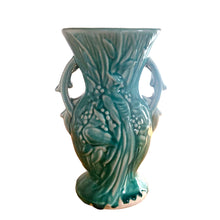 Load image into Gallery viewer, Vintage Art Deco gloss turquoise Peacock handled vase with birds and botanicals. Crafted by McCoy Pottery, 1948. This rare piece is must for any McCoy art pottery collector!

In as found vintage condition, repaired chipped at the rim, chip at the room and crazing commensurate with age. Maker&#39;s mark.

Measures 4 5/8 x 8 1/8 inches

