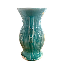 Load image into Gallery viewer, Vintage Art Deco gloss turquoise Peacock handled vase with birds and botanicals. Crafted by McCoy Pottery, 1948. This rare piece is must for any McCoy art pottery collector!

In as found vintage condition, repaired chipped at the rim, chip at the room and crazing commensurate with age. Maker&#39;s mark.

Measures 4 5/8 x 8 1/8 inches
