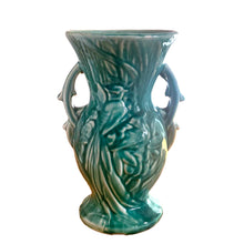 Load image into Gallery viewer, Vintage Art Deco gloss turquoise Peacock handled vase with birds and botanicals. Crafted by McCoy Pottery, 1948. This rare piece is must for any McCoy art pottery collector!

In as found vintage condition, repaired chipped at the rim, chip at the room and crazing commensurate with age. Maker&#39;s mark.

Measures 4 5/8 x 8 1/8 inches
