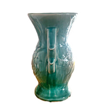 Load image into Gallery viewer, Vintage Art Deco gloss turquoise Peacock handled vase with birds and botanicals. Crafted by McCoy Pottery, 1948. This rare piece is must for any McCoy art pottery collector!

In as found vintage condition, repaired chipped at the rim, chip at the room and crazing commensurate with age. Maker&#39;s mark.

Measures 4 5/8 x 8 1/8 inches
