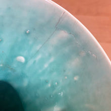 Load image into Gallery viewer, Vintage Art Deco gloss turquoise Peacock handled vase with birds and botanicals. Crafted by McCoy Pottery, 1948. This rare piece is must for any McCoy art pottery collector!

In as found vintage condition, repaired chipped at the rim, chip at the room and crazing commensurate with age. Maker&#39;s mark.

Measures 4 5/8 x 8 1/8 inches

