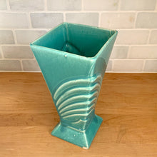 Load image into Gallery viewer, Elevated three-quarter angled view of the vase showing its square opening and the fan design wrapping the front panel
