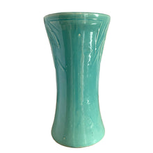 Load image into Gallery viewer, Beautiful vintage large turquoise trumpet vase with embossed leaves and berries at the rim. Crafted by McCoy Pottery, 1930s. This substantially sized vase is must for any art pottery collector!

In excellent vintage condition, no chips/cracks/repairs, manufacturers glaze pops, with age-related crazing. Unmarked.

Measures 7 1/4 x 14 inches
