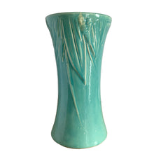 Load image into Gallery viewer, Beautiful vintage large turquoise trumpet vase with embossed leaves and berries at the rim. Crafted by McCoy Pottery, 1930s. This substantially sized vase is must for any art pottery collector!

In excellent vintage condition, no chips/cracks/repairs, manufacturers glaze pops, with age-related crazing. Unmarked.

Measures 7 1/4 x 14 inches
