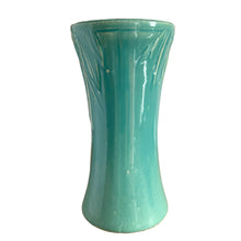 Load image into Gallery viewer, Beautiful vintage large turquoise trumpet vase with embossed leaves and berries at the rim. Crafted by McCoy Pottery, 1930s. This substantially sized vase is must for any art pottery collector!

In excellent vintage condition, no chips/cracks/repairs, manufacturers glaze pops, with age-related crazing. Unmarked.

Measures 7 1/4 x 14 inches
