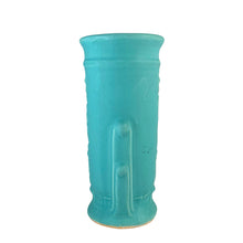 Load image into Gallery viewer, Vintage Art Deco matte turquoise cylinder vase 140 featuring embossed roses. Crafted by Robinson Ransbottom Pottery Co., 1938. This rare piece is must for any art pottery collector! A lovely way to enhance your home&#39;s decor or give as a gift!

In as found vintage condition, no chips/repairs, hairline crack, see photos. Marked 140/- and stamped USA.

Measures 3 3/4 x 8 inches
