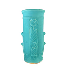 Load image into Gallery viewer, Vintage Art Deco matte turquoise cylinder vase 140 featuring embossed roses. Crafted by Robinson Ransbottom Pottery Co., 1938. This rare piece is must for any art pottery collector! A lovely way to enhance your home&#39;s decor or give as a gift!

In as found vintage condition, no chips/repairs, hairline crack, see photos. Marked 140/- and stamped USA.

Measures 3 3/4 x 8 inches
