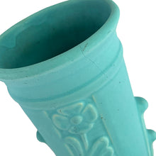 Load image into Gallery viewer, Vintage Art Deco matte turquoise cylinder vase 140 featuring embossed roses. Crafted by Robinson Ransbottom Pottery Co., 1938. This rare piece is must for any art pottery collector! A lovely way to enhance your home&#39;s decor or give as a gift!

In as found vintage condition, no chips/repairs, hairline crack, see photos. Marked 140/- and stamped USA.

Measures 3 3/4 x 8 inches
