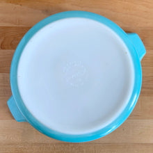 Load image into Gallery viewer, Overhead view of vintage PYREX Butterprint 475-B casserole, showing white Opalware base with vivid turquoise exterior, maker's mark and tab handles
