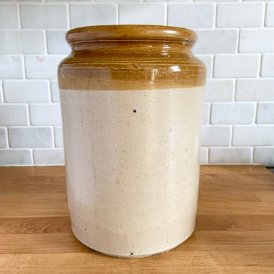 This antique two-tone mustard and natural salt glazed pickling crock was a farmhouse and cold cellar staple in the late 19th and early 20th centuries! This one is unmarked and was likely made in the potteries district in England. Fill this beauty with flowers or your favourite houseplant for a stunning addition to farmhouse or rustic decor.