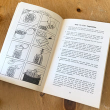 Load image into Gallery viewer, This vintage softcover Vegetables, Fruits &amp; Juices - Canning and Freezing. There are 47 pages with recipes and black and white illustrations. Text by Irene Chalmers, illustrated by Michael Meyerowitz and published by Potpourri Press, 1974. A handy guide to canning your favourite foods.

In excellent vintage condition, cover has a tiny fold at the top right. Age-related foxing/yellowing of the pages.

Measurements 5 3/8 x 8 1/2 inches
