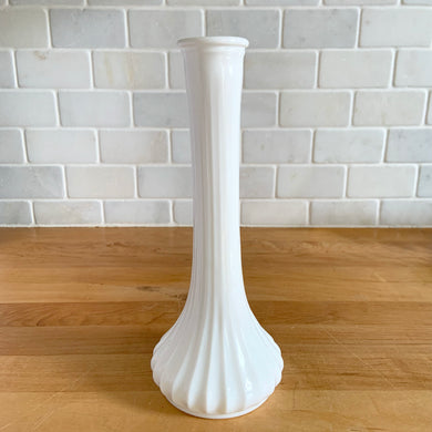 Classic elegant vintage vertically fluted milk glass floral bud vase. Crafted by Hoosier Glass, USA, circa 1960s. This lovely vase has beautiful lines that would enhance any flower arrangement and would make a perfect addition to cottage, farmhouse or wedding decor.  In excellent condition, no chips.  Measures 3 1/2 x 9 inches