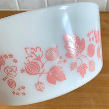 Load image into Gallery viewer, Close-up of vibrant and shiny pink Gooseberry pattern printed on white Opalware PYREX casserole dish, Corning Glass Works 1960s
