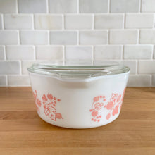 Load image into Gallery viewer, Side view of pink PYREX Gooseberry casserole dish 474-B showing Cinderella tab handles and pink-on-white pattern
