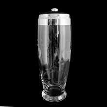 Load image into Gallery viewer, Fabulous vintage clear glass cocktail shaker cut with the classic Cornflower pattern, topped with a chrome lid. Crafted by WJ Hughes, Canada, 1960s. Add this Canadian classic to your barware collection!

In overall excellent vintage condition, no chips, minor wear.

Measures 3 1/2 x 10 1/2 inches
