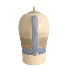 Load image into Gallery viewer, Vintage Art Deco style Wedding Ring coffee set in the blue, rust and gray colourway. Crafted by Susie Cooper, England, 1930s. This kestrel-shaped set comprised of a coffee pot with lid, creamer and sugar with four demitasse cups and saucers.

The set is in generally good vintage condition with no chips, cracks, or repairs. Each piece shows age-related crazing. The coffee pot has a chip at the top of the spout, and the sugar bowl has staining on the bottom. All pieces have maker's marks.
