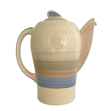 Load image into Gallery viewer, Vintage Art Deco style Wedding Ring coffee set in the blue, rust and gray colourway. Crafted by Susie Cooper, England, 1930s. This kestrel-shaped set comprised of a coffee pot with lid, creamer and sugar with four demitasse cups and saucers.

The set is in generally good vintage condition with no chips, cracks, or repairs. Each piece shows age-related crazing. The coffee pot has a chip at the top of the spout, and the sugar bowl has staining on the bottom. All pieces have maker's marks.
