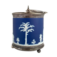 Load image into Gallery viewer, Side view of Wedgwood cobalt blue Jasperware biscuit barrel displaying continuous white neoclassical relief decoration with classical figures on deep blue ground
