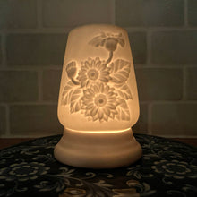 Load image into Gallery viewer, Pretty vintage white bisque ceramic two piece fairy lamp with embossed floral design. Create a beautiful ambient glow with this piece.  In excellent condition, free from chips/cracks/repairs.  Measures 3 3/16 x 4 1/2 inches
