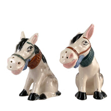 Load image into Gallery viewer, Vintage hand painted white and black donkey ceramic salt and pepper shakers with corks. Japan, 1950s. Add these unique shakers to your collection!

In excellent vintage condition, no chips/cracks/repairs. Unmarked

Measures 3 1/2 x 1 3/4 x 4 inches
