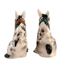 Load image into Gallery viewer, Vintage hand painted white and black donkey ceramic salt and pepper shakers with corks. Japan, 1950s. Add these unique shakers to your collection!

In excellent vintage condition, no chips/cracks/repairs. Unmarked

Measures 3 1/2 x 1 3/4 x 4 inches
