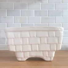Load image into Gallery viewer, Vintage gloss white glazed figural rectangular strawberry basket ceramic planter. Crafted by Brush Pottery, 1940s. This rare piece is must for any Brush art pottery collector!

In excellent vintage condition, no chips/cracks/repairs. Maker's mark.

Measures 7 1/2 x 5 1/2 x 4 1/8 inches
