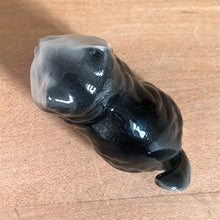Load image into Gallery viewer, Delightful vintage gray and white cat porcelain figurine. Japan. Add this sweet figurine to your collection!

In excellent condition, no chips/cracks.

Measures 2 x 7/8 x 1 3/4 inches
