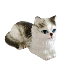 Load image into Gallery viewer, Delightful vintage white and gray Persian cat ceramic porcelain figurine. Imported by Giftcraft from Japan 1970s. Add this sweet figurine to your collection!

In excellent condition, no chips/cracks/repairs. Original stickers.

Measures 3 7/8 x 2 3/8 x 2 3/8 inches
