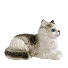 Load image into Gallery viewer, Delightful vintage white and gray Persian cat ceramic porcelain figurine. Imported by Giftcraft from Japan 1970s. Add this sweet figurine to your collection!

In excellent condition, no chips/cracks/repairs. Original stickers.

Measures 3 7/8 x 2 3/8 x 2 3/8 inches
