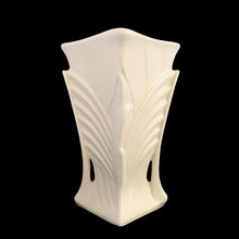 Load image into Gallery viewer, Exceptionally beautiful vintage matte white art deco vase, features a double fan design on a square trumpet shaped vase. Crafted by McCoy Pottery, 1943. This rare vase must for any art pottery collector!

In excellent vintage condition, no chips/cracks/repairs or noticeable crazing. Maker&#39;s mark on the bottom.

Measures 6 1/2 x 9 1/4 inches
