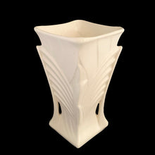 Load image into Gallery viewer, Exceptionally beautiful vintage matte white art deco vase, features a double fan design on a square trumpet shaped vase. Crafted by McCoy Pottery, 1943. This rare vase must for any art pottery collector!

In excellent vintage condition, no chips/cracks/repairs or noticeable crazing. Maker&#39;s mark on the bottom.

Measures 6 1/2 x 9 1/4 inches
