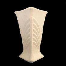Load image into Gallery viewer, Exceptionally beautiful vintage matte white art deco vase, features a double fan design on a square trumpet shaped vase. Crafted by McCoy Pottery, 1943. This rare vase must for any art pottery collector!

In excellent vintage condition, no chips/cracks/repairs or noticeable crazing. Maker&#39;s mark on the bottom.

Measures 6 1/2 x 9 1/4 inches
