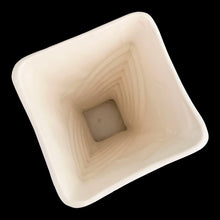 Load image into Gallery viewer, Exceptionally beautiful vintage matte white art deco vase, features a double fan design on a square trumpet shaped vase. Crafted by McCoy Pottery, 1943. This rare vase must for any art pottery collector!

In excellent vintage condition, no chips/cracks/repairs or noticeable crazing. Maker&#39;s mark on the bottom.

Measures 6 1/2 x 9 1/4 inches
